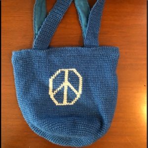 100% blue wool Peace sign purse/sack made in Nepal.